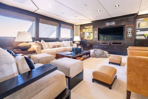 Luxurious yacht interiors feature plush seating and entertainment systems for ultimate relaxation at sea.