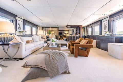 Luxurious yacht interiors offer a serene escape with plush seating, elegant lighting, and panoramic views.