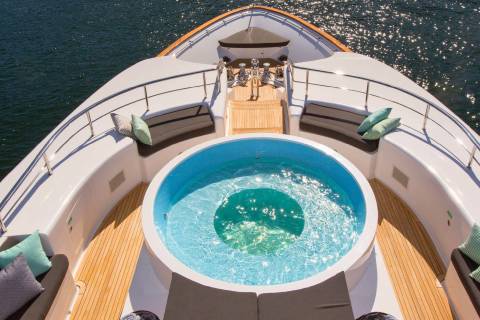 Relax in the onboard jacuzzi while surrounded by the sparkling blue waters of the ocean.