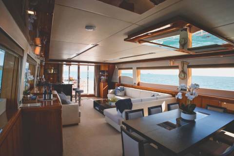 Luxurious yacht interiors offer stunning ocean views from every angle, blending comfort with the beauty of the sea.