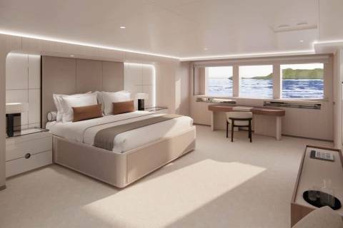 Luxurious yacht cabin offers a serene retreat with ocean views, a comfortable bed, and a dedicated workspace.