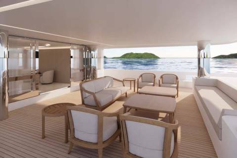Relax on the spacious deck of this luxurious yacht, enjoying breathtaking ocean views and a serene island landscape.
