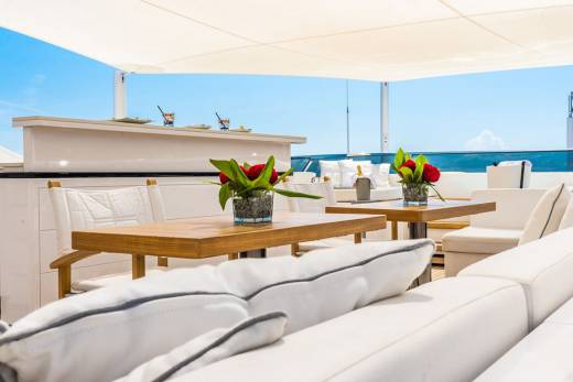 Enjoy refreshing cocktails and stunning ocean views from this luxurious yacht deck.