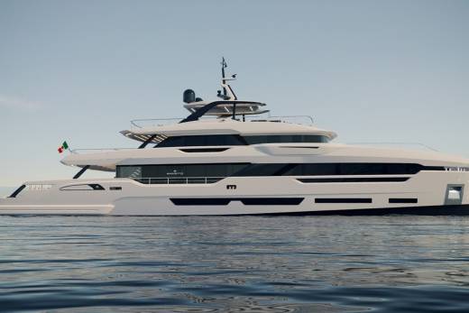 A sleek, modern white yacht glides across calm blue waters under a clear sky.