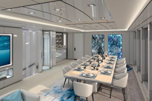 A luxurious yacht dining room features a long table set for a formal meal with a stunning ocean view.