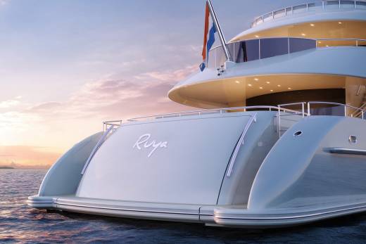 A luxurious yacht named Riya glides across calm waters under a pastel sunset sky.