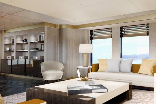 This luxurious living room offers stunning water views through expansive windows, complemented by elegant furnishings and built-in shelving.