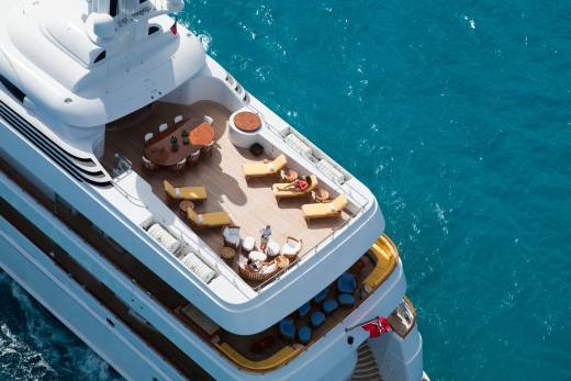 Luxurious yachts offer unparalleled relaxation and stunning ocean views from their expansive decks.