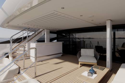 Relax on the spacious deck of this luxury yacht, complete with a bar and comfortable seating overlooking the tranquil sea.