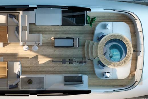 Relax in the circular jacuzzi on this luxurious yacht's expansive wooden deck.