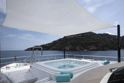 Relax in the onboard jacuzzi with stunning views of the Mediterranean coastline from this luxurious yacht.