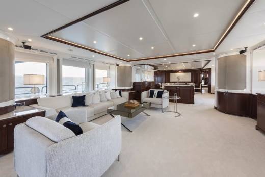 Luxurious yacht interiors offer a serene escape with plush seating and expansive ocean views.