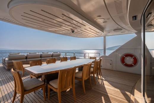 Dine al fresco on the expansive deck of this luxurious yacht, surrounded by the tranquil beauty of the open sea.