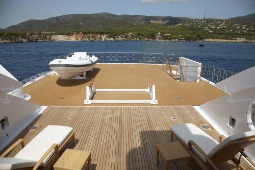Relax on the spacious deck of this luxury yacht, surrounded by stunning Mediterranean scenery.