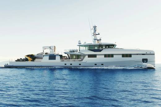 A sleek white yacht cruises through calm blue waters under a bright, clear sky.