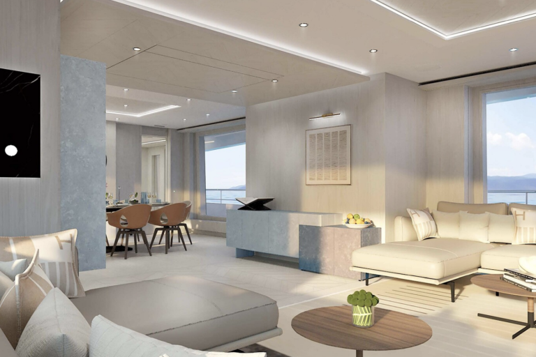 Luxurious yacht interiors offer stunning ocean views from a spacious lounge and dining area.
