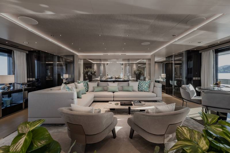 Luxurious yacht interiors feature plush seating and elegant decor, offering a sophisticated retreat at sea.