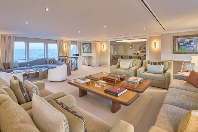 Luxurious yacht interiors offer stunning ocean views and elegant seating arrangements for ultimate relaxation.