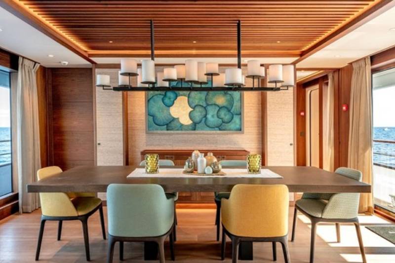 Dine in sophisticated style aboard this luxurious yacht, surrounded by elegant decor and the calming ocean vista.