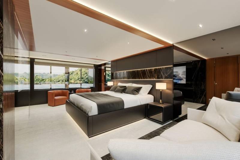 Luxurious yacht bedroom offers stunning water views and sophisticated design for ultimate relaxation.
