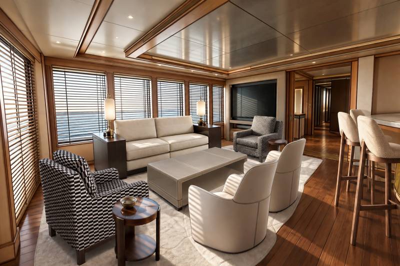 A modern lounge area with a white sofa and patterned armchairs sits in the foreground, while a wooden-paneled interior with large windows and a bar area fills the background.