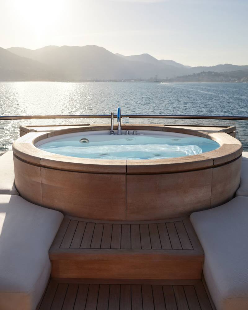 Relax in the onboard jacuzzi while taking in the breathtaking coastal mountain views.
