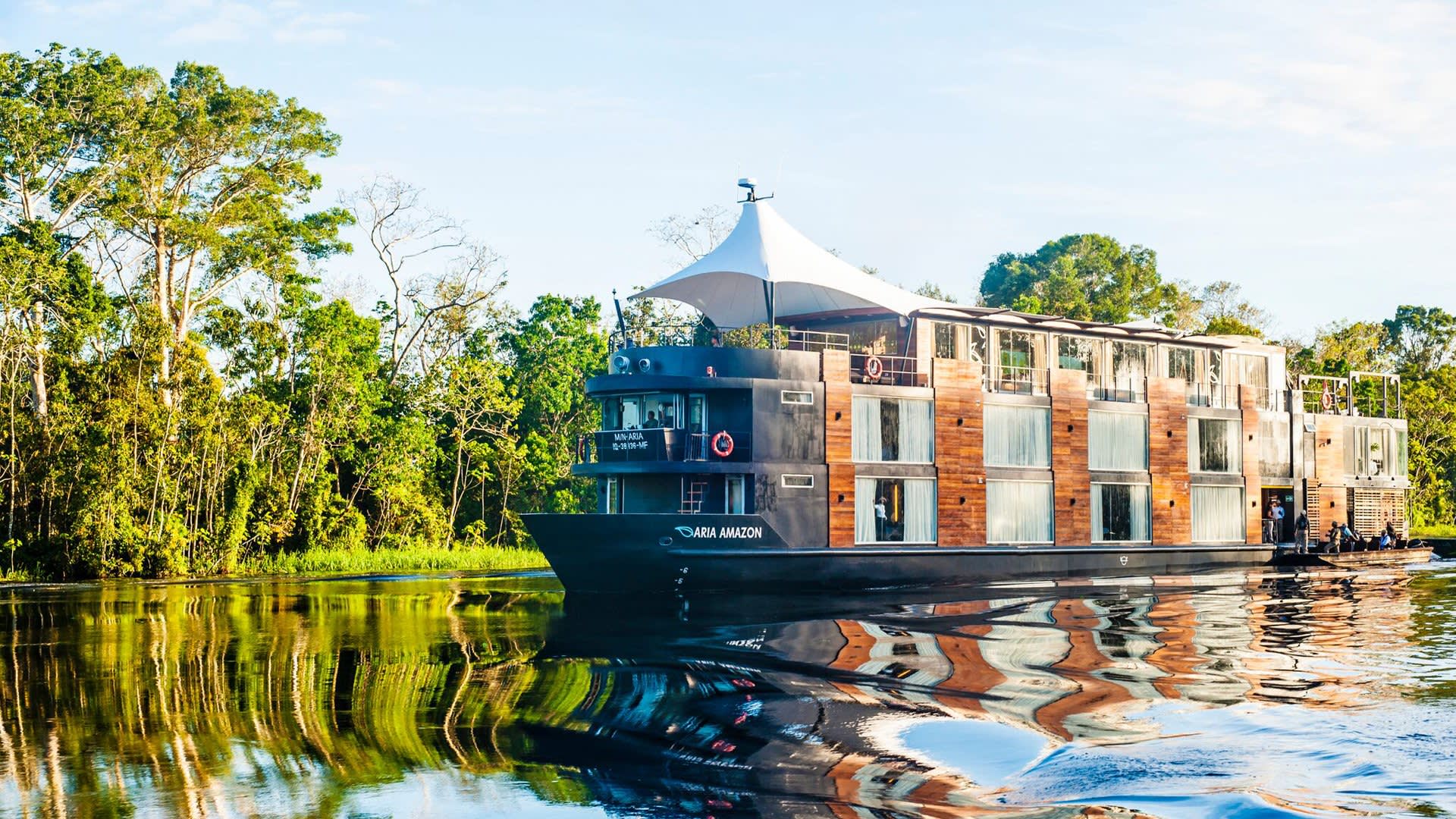 Aria Amazon glides through the lush jungle waterways of Peru, offering luxurious accommodations amidst breathtaking natural beauty.