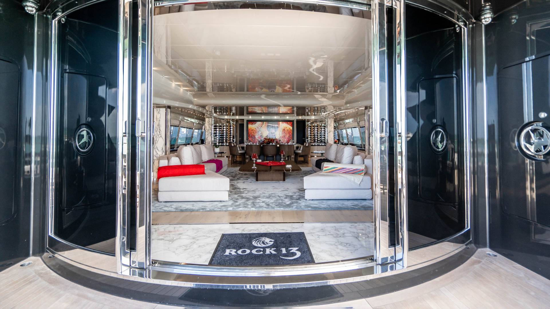 Step into the opulent interior of the yacht "Rock 13" with its sleek design and luxurious furnishings.