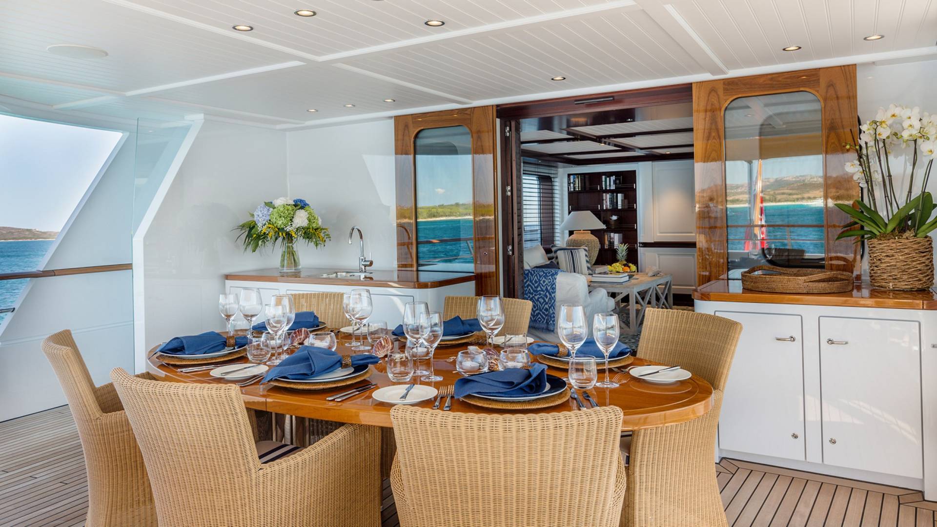 Dine al fresco on the deck of this luxurious yacht, surrounded by the stunning turquoise waters of the Mediterranean.