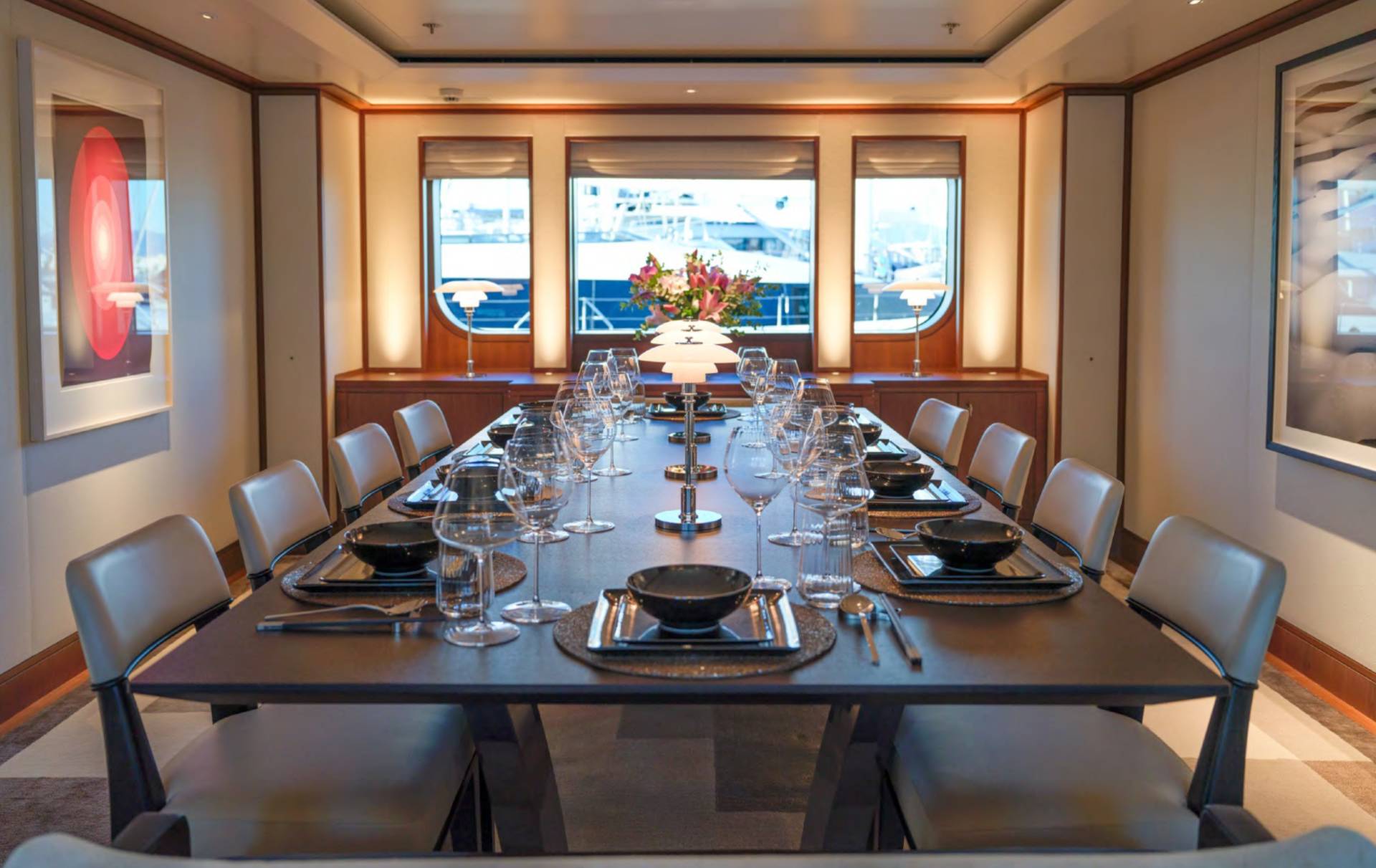 Dine in elegant style aboard this luxurious yacht, set for a memorable meal with a view.