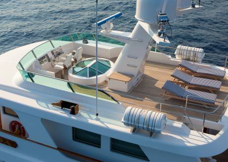 Relax on the spacious deck of this luxurious yacht, complete with comfortable loungers and a stunning view of the open sea.