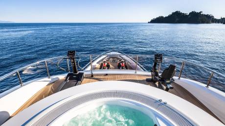Enjoy a refreshing workout on the deck of this luxurious yacht, with a bubbling hot tub and stunning ocean views.