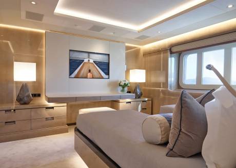 Luxurious yacht interiors offer a serene escape with warm lighting, elegant furnishings, and breathtaking ocean views.