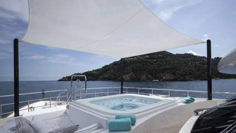 Relax in the onboard jacuzzi with stunning views of the Mediterranean coastline from this luxurious yacht.