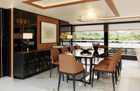 A luxurious dining room with a sleek black table and plush brown chairs offers stunning views of a serene waterfront landscape.