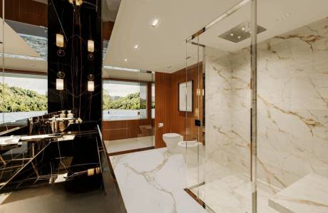 Luxurious marble and dark wood create a spa-like oasis with stunning water views.