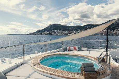 Relax in the onboard jacuzzi with a stunning view of the Mediterranean coastline.