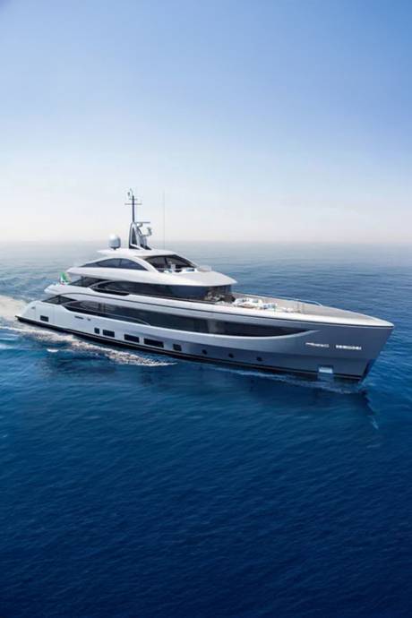 A sleek, modern yacht glides through calm, blue ocean waters under a clear sky.